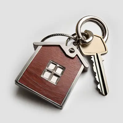 Set of house keys on a keychain.